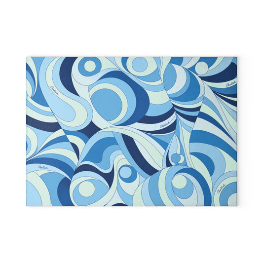 Blue psychedelic swirl print tempered glass challah board on a Shabbat table