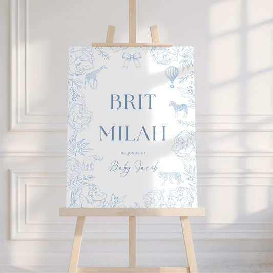 Personalized Brit Milah sign displayed on a wooden easel